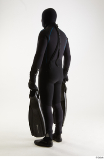 Jake Perry Diver with Fins holding diver fins standing whole…